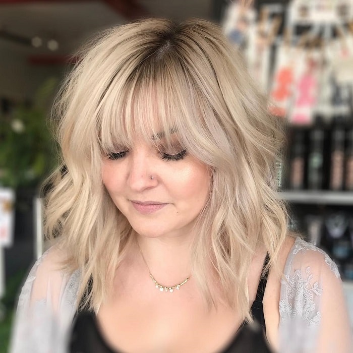Blonde Hair with Dark Roots and Bangs