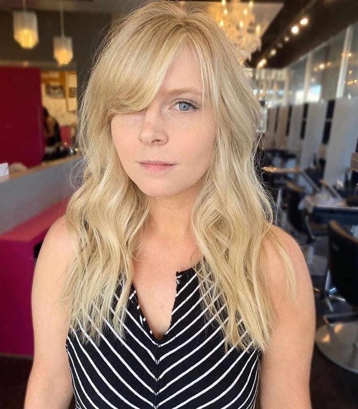 Long Blonde Hair With Side Swept Bangs