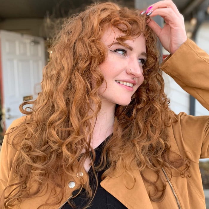 Long Layered Curly Hair with Bangs