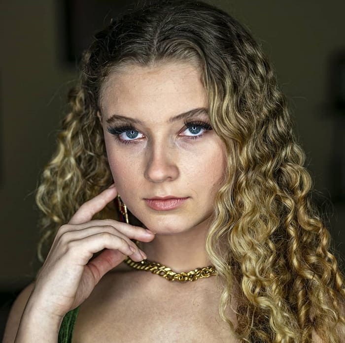 Center Part Blonde Curly Hair