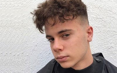 low fade hairstyle for men with curly hair