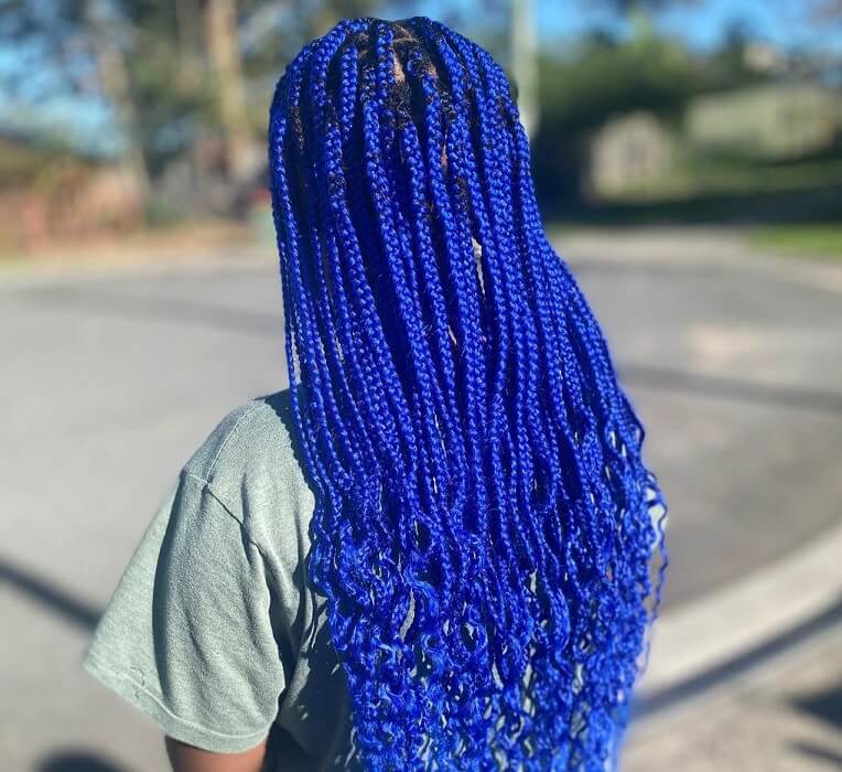 blue box braids with curly ends