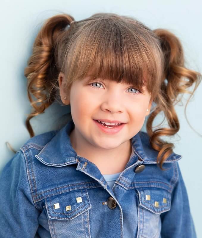 little girl's hairstyle with bangs