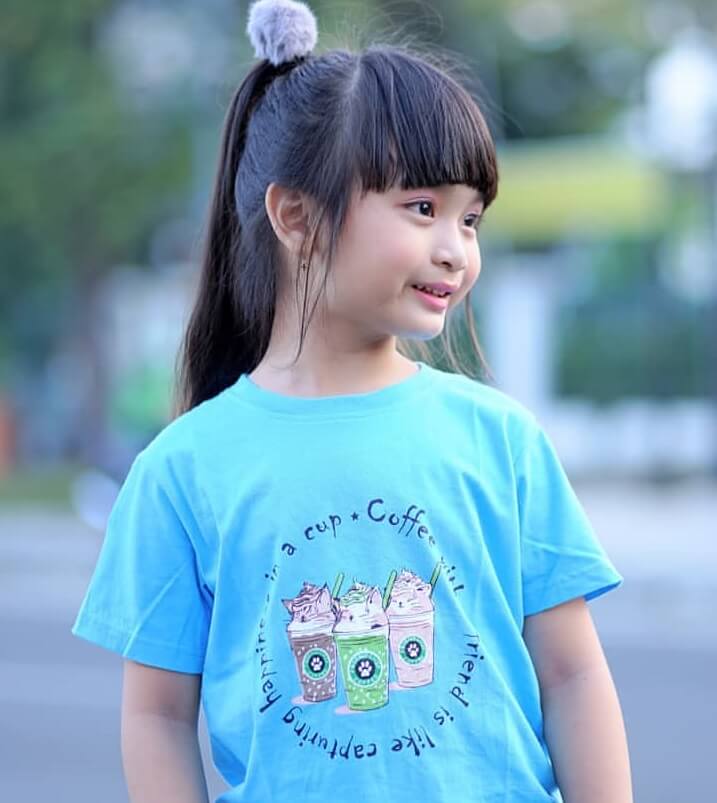 little girl's ponytail with bangs