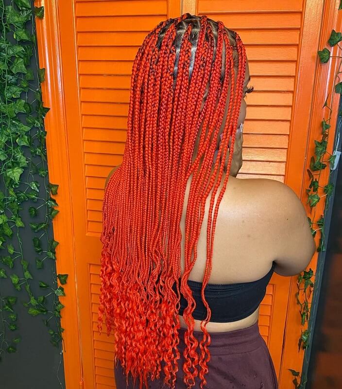 orange red curly box braids