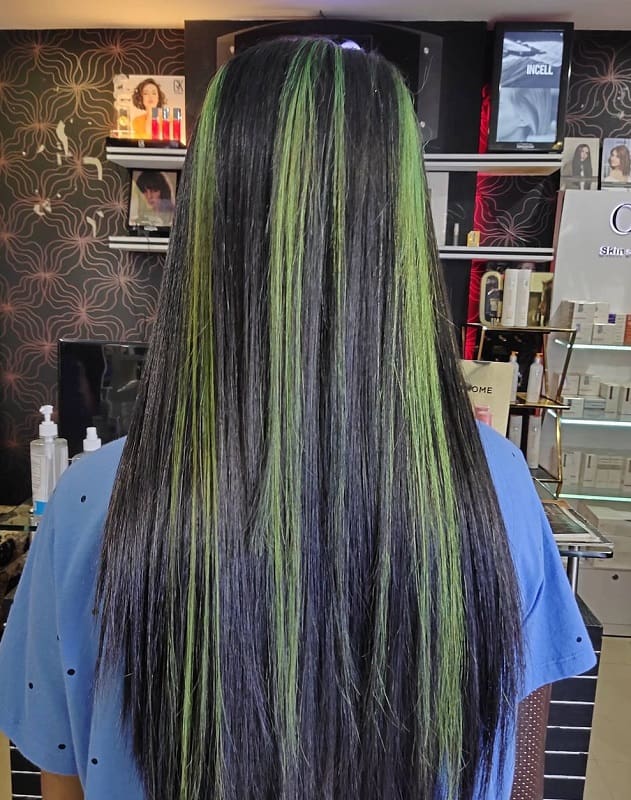 black hair with green highlights